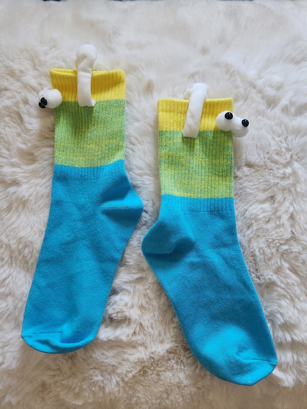 Socks with eyes and arms